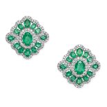 A PAIR OF EMERALD AND DIAMOND CLUSTER EARRINGS in 18ct white gold, each set with an oval cut emer...