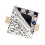 A MODERNIST ONYX, SAPPHIRE AND DIAMOND RING in 18ct yellow and white gold, set with a piece of po...