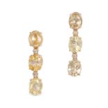 A PAIR OF YELLOW SAPPHIRE AND DIAMOND DROP EARRINGS in 18ct yellow gold, comprising a row of alte...