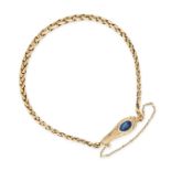 A SAPPHIRE SNAKE BRACELET in yellow gold, designed as a snake coiled around itself, the head set ...