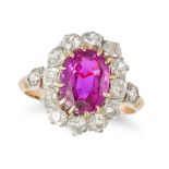 AN ANTIQUE BURMA NO HEAT RUBY AND DIAMOND CLUSTER RING set with an oval cut ruby of 3.24 carats i...