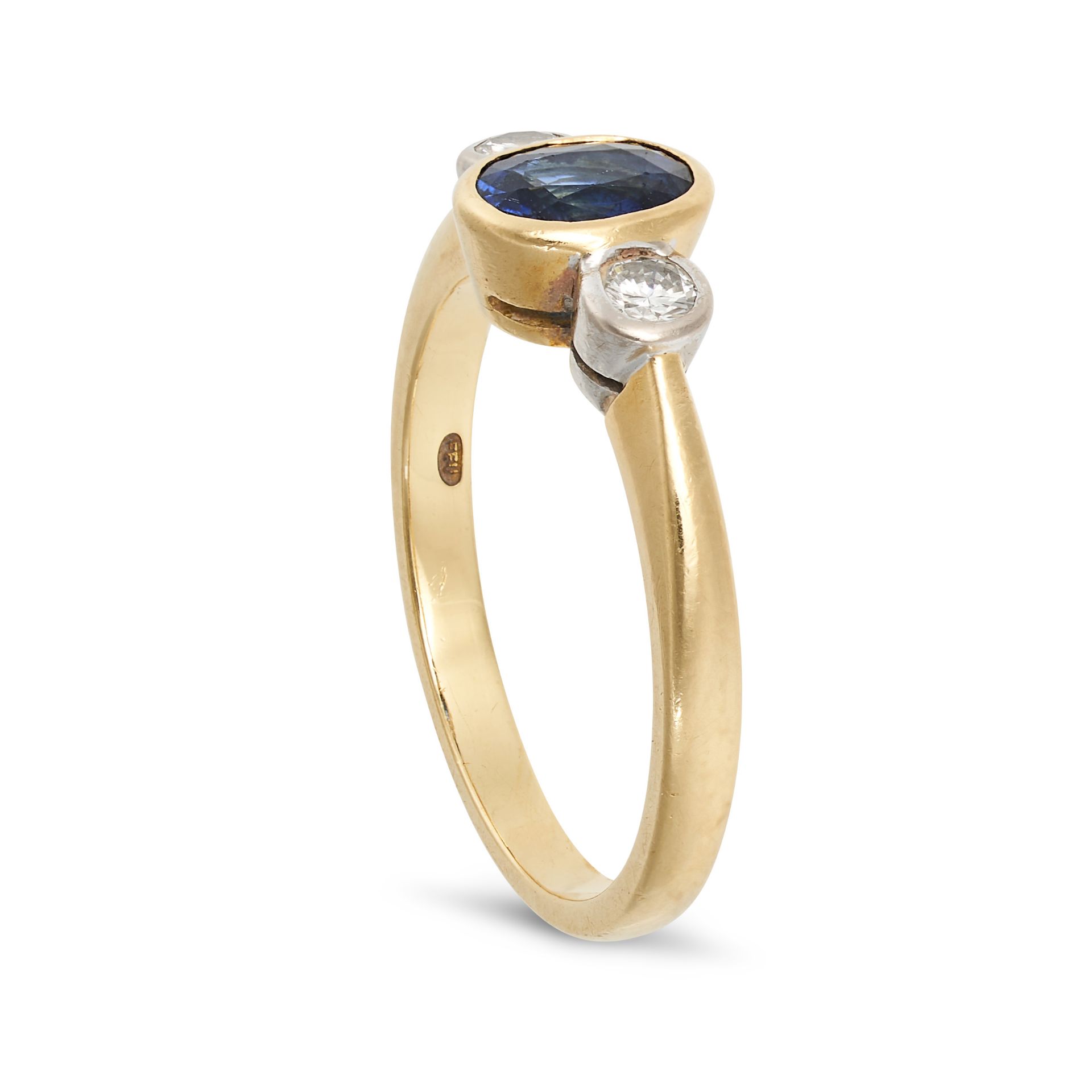 A SAPPHIRE AND DIAMOND THREE STONE RING in 18ct yellow gold, set with an oval cut sapphire accent... - Image 2 of 2