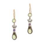 A PAIR OF PERIDOT, AMETHYST AND DIAMOND DROP EARRINGS each set with a cabochon peridot suspending...