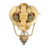 AN ANTIQUE EMERALD LOCKET BROOCH in yellow gold, designed as a belt buckle with vine leaves, set ...