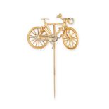 A FRENCH DIAMOND AND RUBY BICYCLE STICK PIN in 18ct yellow gold, designed as an articulated bicyc...