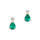 A PAIR OF SYNTHETIC EMERALD AND DIAMOND EARRINGS in 9ct yellow gold, each set with a single cut d...