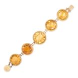 AN ANTIQUE CITRINE BRACELET in yellow gold, set with five large round cut citrines within beaded ...