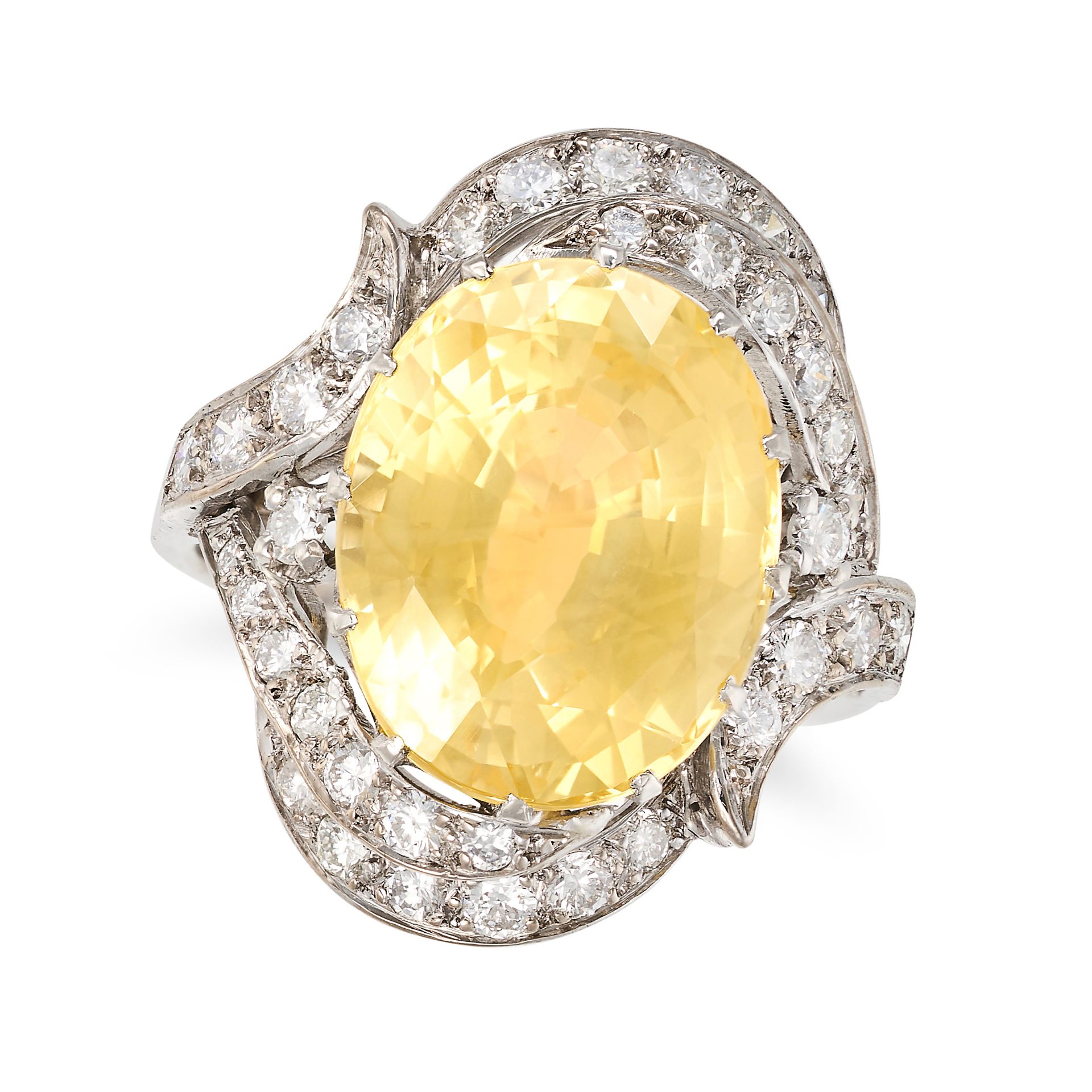 A CEYLON NO HEAT YELLOW SAPPHIRE AND DIAMOND RING in 18ct white gold and platinum, set with an ov...