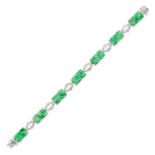 A JADEITE JADE BRACELET in white gold, set with a row of rectangular carved jadeite jade plaques,...