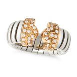 BULGARI, A DIAMOND PARENTESI RING in 18ct yellow gold and steel, the open tubogas ring set with r...