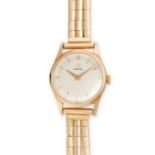 OMEGA, A VINTAGE GOLD LADIES WRISTWATCH, 1970'S in 18ct rose gold, the circular dial with baton m...