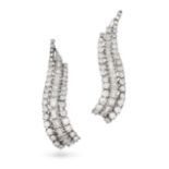 A PAIR OF DIAMOND WING EARRINGS in 18ct white gold, each designed as a stylised wing set with a r...