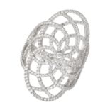 MESSIKA, A DIAMOND GATSBY RING in 18ct white gold, the openwork ring in a stylised floral design ...