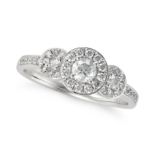 A DIAMOND DRESS RING in platinum, set with three round brilliant cut diamonds in borders of round...
