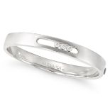 MESSIKA, A DIAMOND MOVE BANGLE in 18ct white gold, the hinged bangle set with three moveable roun...