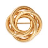 TIFFANY & CO., A VINTAGE KNOT BROOCH in 14ct yellow gold, in a stylised knot design, signed Tiffa...