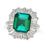 A GREEN TOURMALINE AND DIAMOND BALLERINA RING in platinum, set with an octagonal step cut green t...