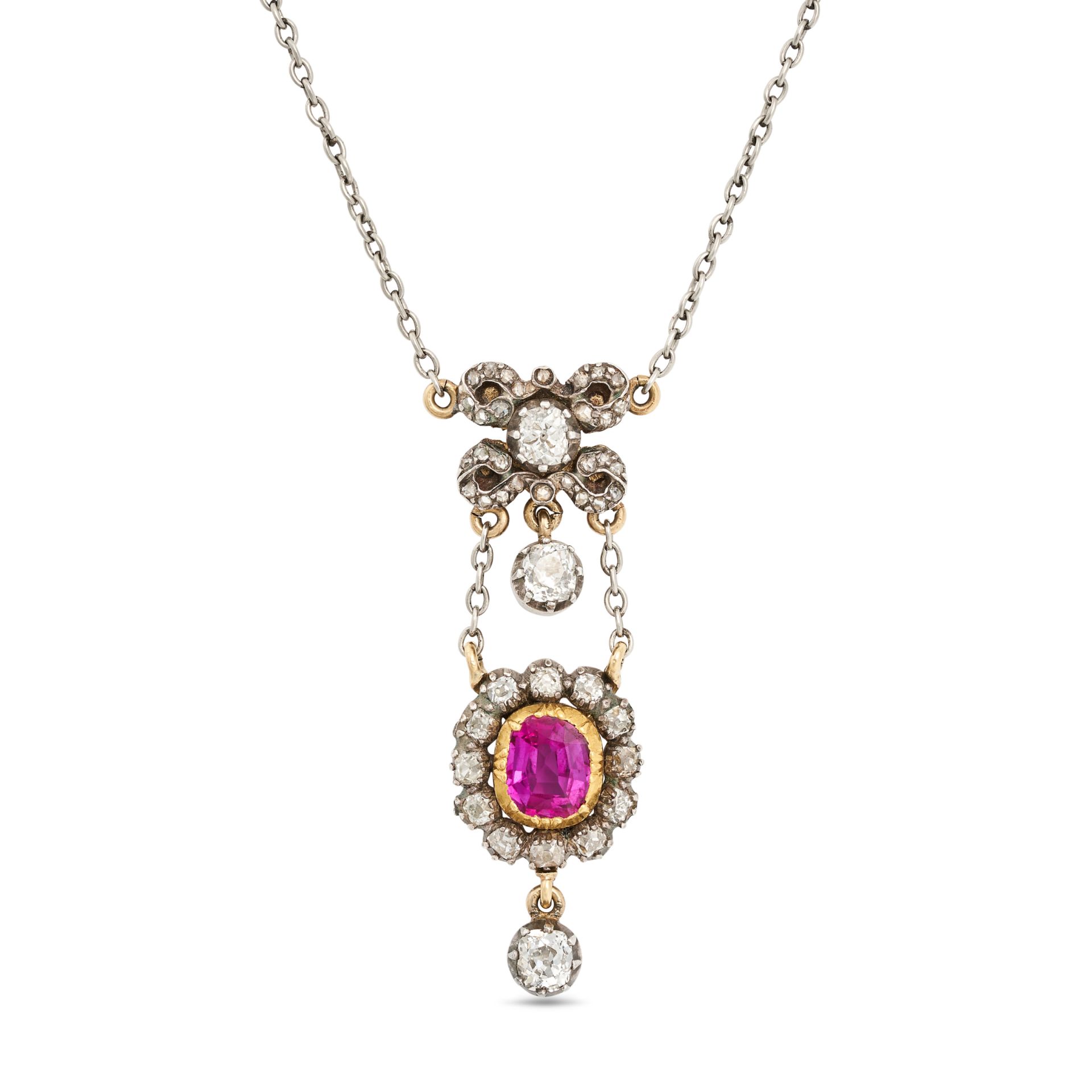 AN ANTIQUE RUBY AND DIAMOND PENDANT NECKLACE in yellow gold and silver, the pendant designed as a...