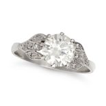 A SOLITAIRE DIAMOND ENGAGEMENT RING in platinum, set with a round brilliant cut diamond of approx...