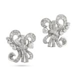 A PAIR OF DIAMOND EARRINGS in platinum and 18ct white gold, each with scrolling designs set with ...