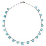 A FINE ART DECO BLUE ZIRCON RIVIERE NECKLACE, EARLY 20TH CENTURY comprising a belcher link chain ...