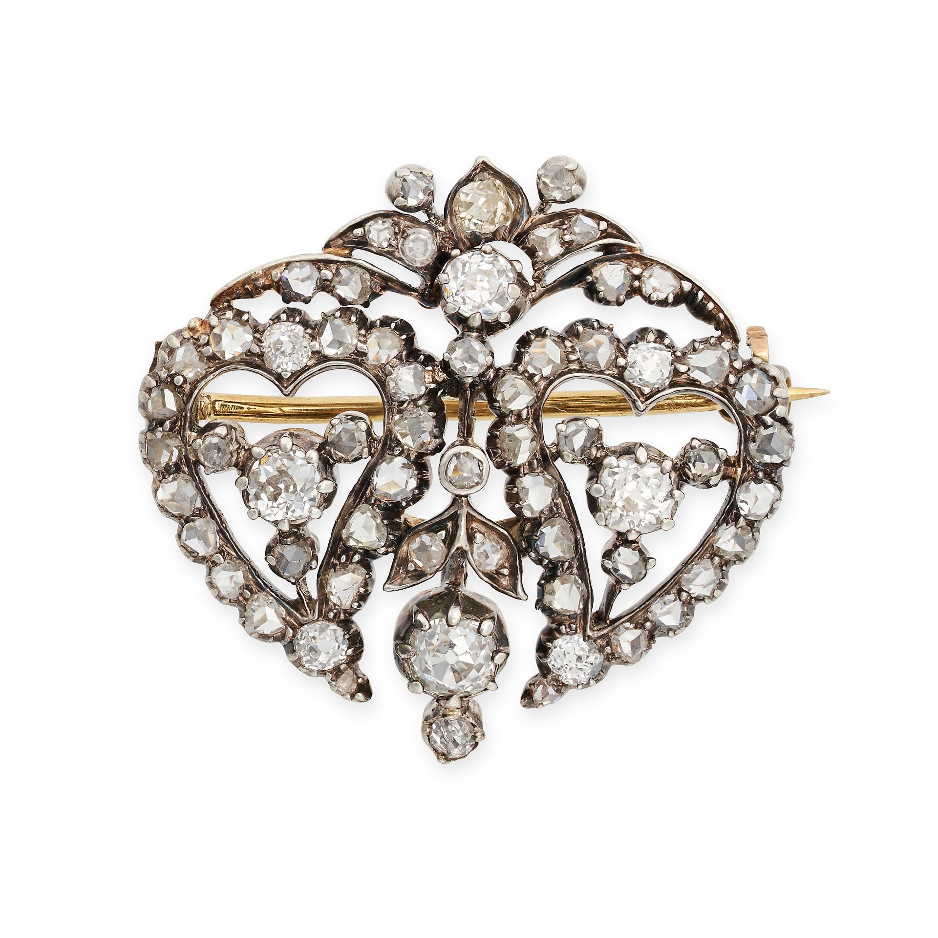 AN ANTIQUE DIAMOND SWEETHEART BROOCH in 14ct yellow gold and silver, designed as two witches hear...
