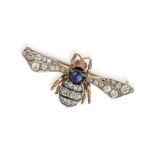 AN ANTIQUE SAPPHIRE, DIAMOND, RUBY AND ENAMEL BEE BROOCH in yellow gold and silver, the body set ...