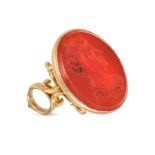 AN ANTIQUE CARNELIAN INTAGLIO FOB SEAL in yellow gold, set with an intaglio engraved with the pro...
