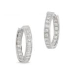 A PAIR OF DIAMOND HOOP EARRINGS in 18ct white gold, each set inside and out with a row of round b...