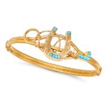 AN ANTIQUE TURQUOISE HORSESHOE AND RIDING CROP BANGLE in yellow gold, the hinged bangle with an a...