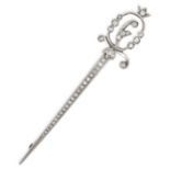 AN ANTIQUE DIAMOND SWORD BROOCH in yellow gold and silver, designed as a sword, set throughout wi...