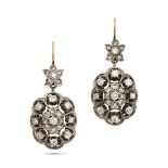 A PAIR OF ANTIQUE DIAMOND DROP EARRINGS in 14ct yellow gold and silver, each comprising a floral ...