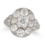 A FINE OLD CUT DIAMOND CLUSTER RING in platinum, set with an old cut diamond of approximately 1.1...