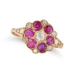 A RUBY AND DIAMOND CLUSTER RING in yellow gold, set with an old cut diamond in a cluster of round...