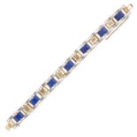 A VINTAGE LAPIS LAZULI BRACELET in 18ct yellow gold and white gold, set with seven pieces of lapi...