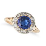 AN ANTIQUE SAPPHIRE AND DIAMOND RING in yellow gold and silver, set with a cushion cut sapphire i...