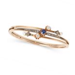 AN ANTIQUE SAPPHIRE, DIAMOND AND PEARL BANGLE in yellow gold, the hinged body in crossover design...