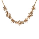 A VINTAGE PEARL FLORAL CHAIN NECKLACE in 9ct yellow gold, the central section set with floral clu...