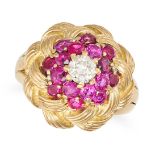 A RUBY AND DIAMOND BOMBE RING in 18ct yellow gold, set with a transitional cut diamond of approxi...