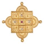 AN ANTIQUE RUBY AND DIAMOND BROOCH / PENDANT in 22ct yellow gold, set with a round cut ruby and r...