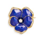 AN ANTIQUE ENAMEL AND DIAMOND PANSY BROOCH in yellow gold, the pansy decorated with blue enamel a...