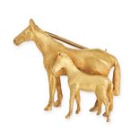 A VINTAGE GOLD MARE AND FOAL HORSE BROOCH in 9ct yellow gold, designed as a mare standing with he...