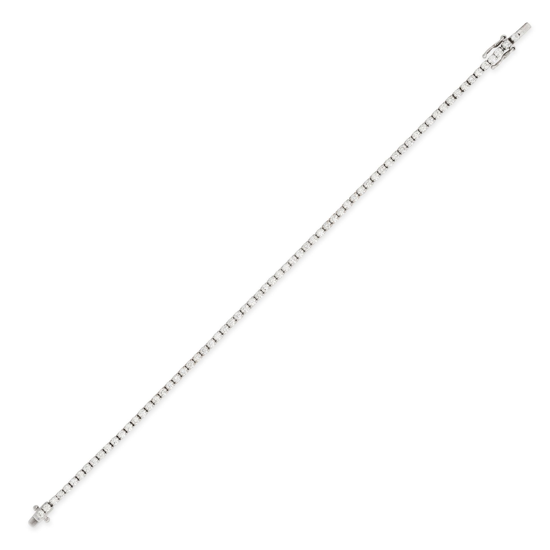 A DIAMOND LINE BRACELET in 18ct white gold, comprising a row of round brilliant cut diamonds all ...