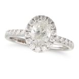 NO RESERVE - A DIAMOND HALO ENGAGEMENT RING in 18ct white gold, set with an oval cut diamond of 1...