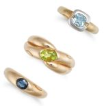 A COLLECTION OF THREE RINGS in 9ct yellow and white gold, a ring set with an oval cut sapphire, a...