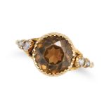 AN ANTIQUE ZIRCON AND DIAMOND RING in 18ct yellow gold, set with a round cut brown zircon of appr...