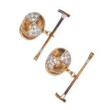 A PAIR OF DIAMOND JOCKEY CUFFLINKS in 9ct gold, designed as a jockey's cap and crop, the cap set ...