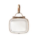 NO RESERVE - A ROCK CRYSTAL LOCKET PENDANT in 9ct rose gold, the hinged locket set with two rock ...