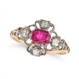 AN ANTIQUE GEORGIAN RUBY AND DIAMOND RING in yellow gold and silver, set with a cushion cut ruby ...