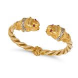 A DIAMOND AND RUBY CHIMERA BANGLE in 18ct yellow gold, the hinged open bangle in a twisted design...